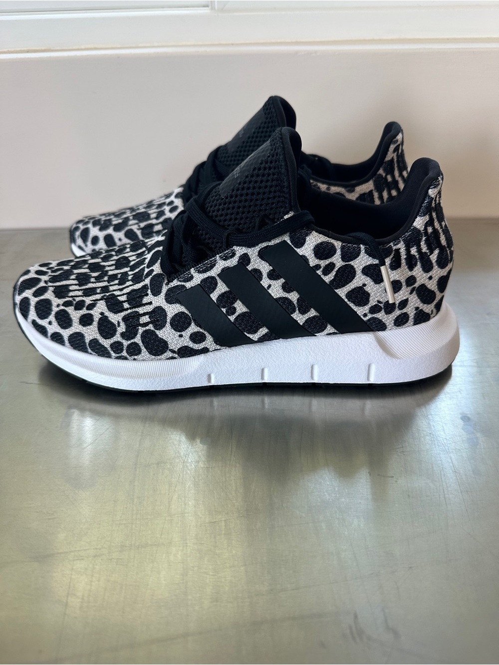 adidas women’s 9 Black & White Animal Print Sneakers